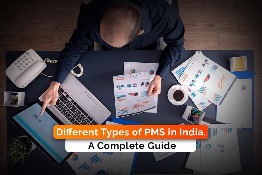 Background image of a person at a desk with a laptop, charts, and tablet, overlaid with the text 'Different Types of PMS in India: A Complete Guide.